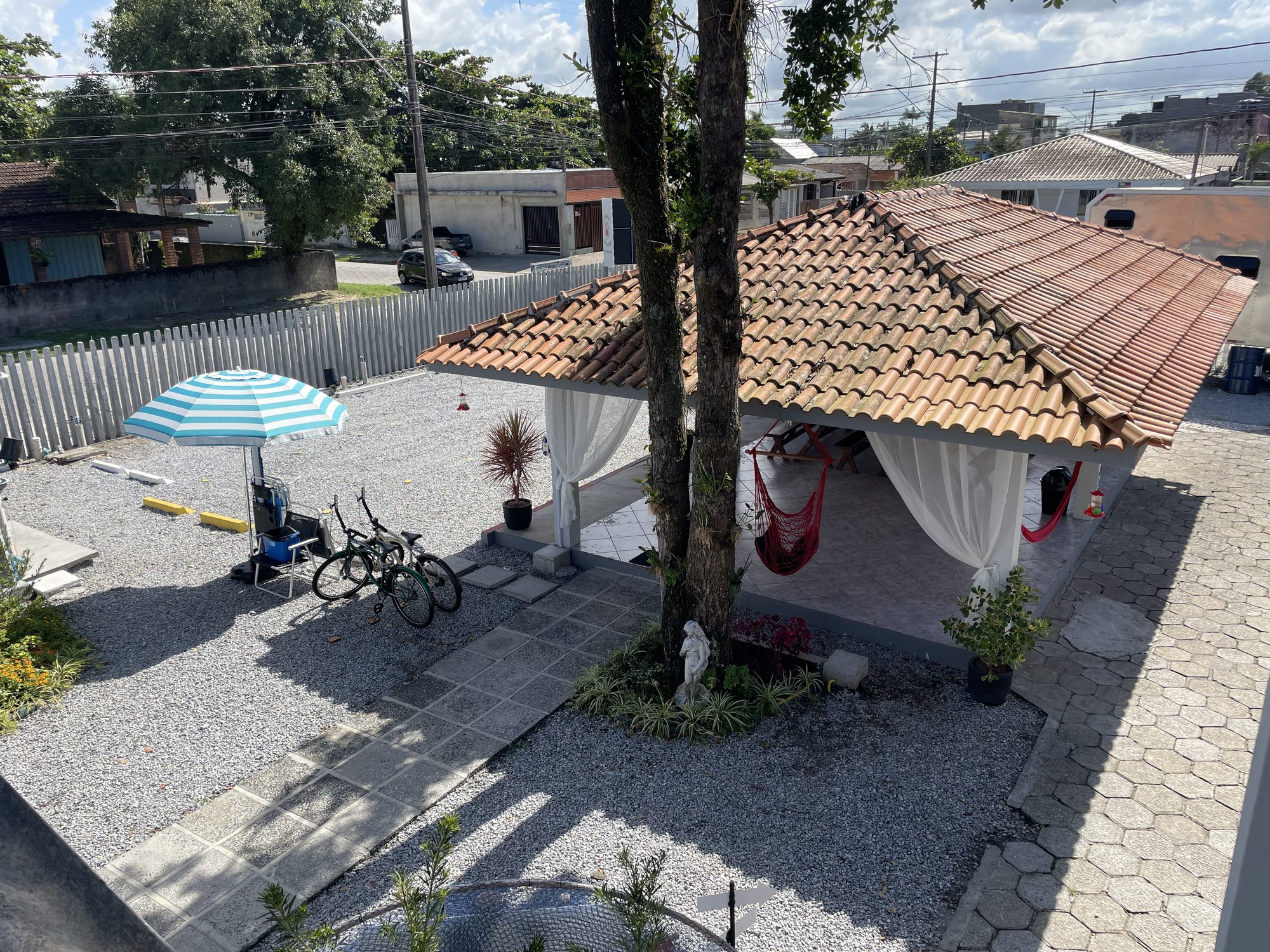 Área externa com jardim — Pousada Siri do Mar